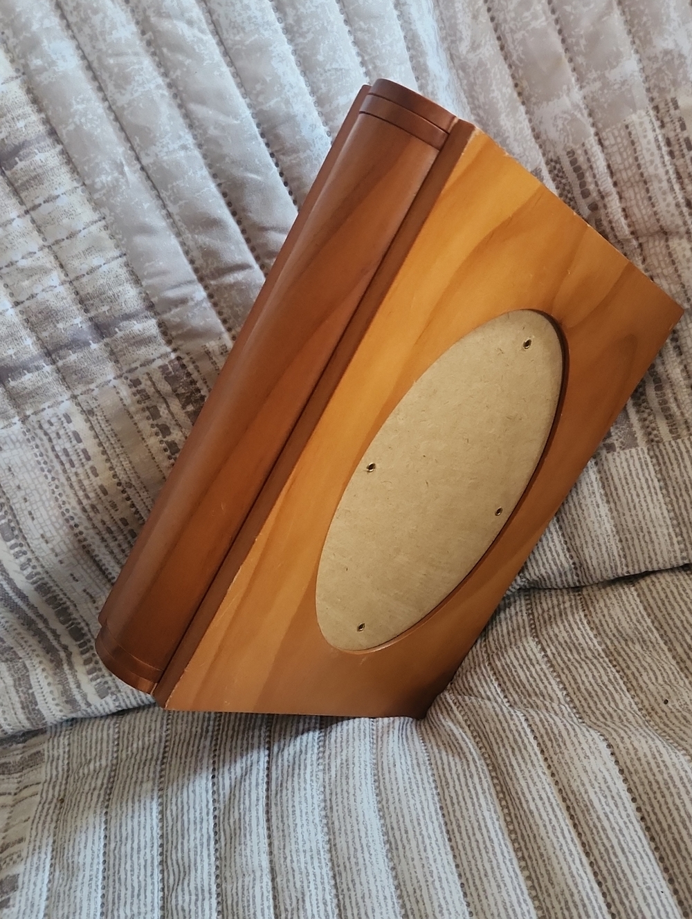 vintage light wood storage box with an oval front opening